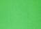 Green textured wall, texture, background. Plane, uneven surface in green color