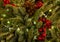 Green thick fluffy Christmas tree holly berry red traditional decoration bump fir garland glowing