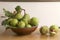 Green and thorny horse chestnut fruits in interior.