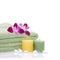 Green Towel, Orchid, Candles and Pebbles