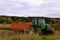 Green Tractor and Agricultural Trailer