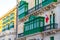 Green traditional maltese balconies at Valletta