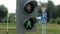 Green traffic light with colorful unfocused lights on a background