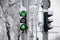 a green traffic light in winter in snow and ice in Ukraine in the city of Dnipro, roads were lifted, a traffic light