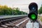 Green traffic lights on the railroad