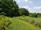 A green trail on the green feld