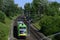 Green tram in sunny day