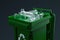 Green Trash dumpster for plastic with white recycling symbol on black background. 3d rendering