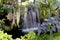 Green tree,flower,waterfall in the garden