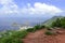 Green Tropical mountains and hiking route on the Dragon\'s Back trail near Hong Kong