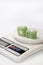 Green turkish delight on the kitchen digital scale