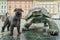 Green turtle bronze statue in the main square in Olomouc next to the Holy Trinity Column. Czech Republic.