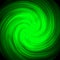 A green twisted galaxy on a black background. Green abstraction with circular motion