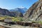 Green valley along Markha valley trek with Kang Yatse peak at background, Ladakh, India
