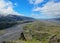 Green valley of Thorsmork, with volcanoes, glaciers, green forest and blue sunny sky in summer day, Highlands of Iceland, Europe