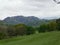 A green valley with trees and forest, fells and dales in the Lake District