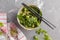 Green vegan kale, cucumber, sunflower seeds salad, top view, cop
