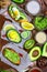 Green vegetables avocados, pepper, lemon, ginger, garlic, oil, sea salt, rucola salad, the concept of healthy eating, copy space,