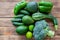 Green vegetables on brown rustic table, top view,  conceptual healthy food