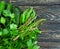 Green vegetables, cucumber, asparagus kitchen  collection , peas on a wooden background rustic