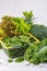 Green vegetables on white background