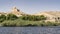 Green vegetation grows on the banks of the Nile River