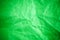 Green vignette crumpled paper