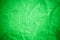 Green vignette crumpled paper