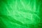 Green vignette crumpled paper