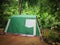 green vintage cabin camping tent