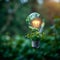 Green vision Light bulb adorned with world map on nature background