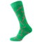 Green voluminous sock with a pattern of santa claus staffs, on white background