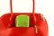 Green wallet in red handbag\'s