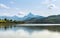 Green water Weissensee lake in Alps Mountains