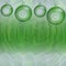 Green wavy christmas background with balls and circle