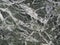 Green white black polished granite marble wall - background tex