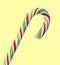 Green, white and red candy Christmas stick, lollipop, spiral shape round, isolated.