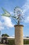 Green and white windmill typical of Mallorca