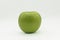 green whole apple granny on a white background