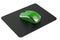 Green Wireless Computer Mouse on mouse mat