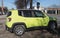 Green yellow Jeep Renegade car in Turin