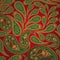 Green and yellow paisley on a red background.