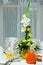 Green, yellow table decor of restaurant event