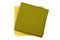 Green and yellow textile napkins on white