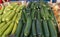 Green and yellow zucchini sold on farmers market