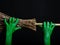 Green zombie hands with a broom. Halloween Theme