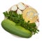 Green zucchini, garlic, a bottle of vegetable oil, parsley, onion, mixed peppercorns against the background of a round wooden