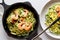 Green zucchini pasta with sauce and tender boiled shrimp