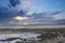 Greenan Bay Low Tide late in the afternoon with Lichens and Seaweed over to the Town of Ayr in the Far Distance