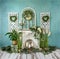 Greenery decorations with white flowers and fireplace, romantic mood